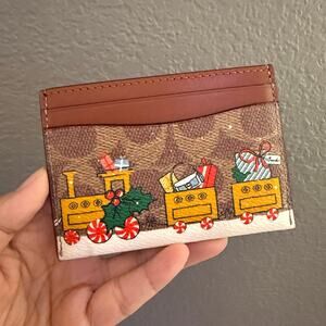 Coach Holiday Essential Card Case In Signature Canvas With Train CY305